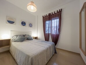 2 slaapkamers, een strijkplank/strijkijzer, reisbedje, gratis wifi