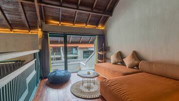 One Bedroom Private Pool Villa | Living area | 50-inch Smart TV with cable channels