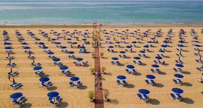 Apartment in the village with swimming pool in the pine forest