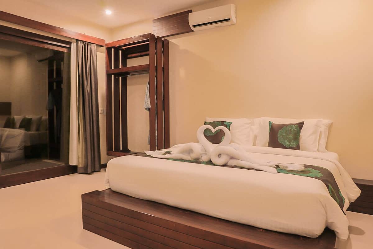 2 slaapkamers, pillowtop-bedden, een gratis minibar