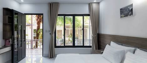 Minibar, laptop workspace, blackout curtains, soundproofing