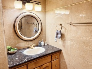 Hair dryer, towels, soap, toilet paper