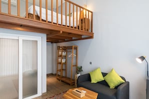 Room, Mezzanine | Living area | 40-inch flat-screen TV with digital channels, TV