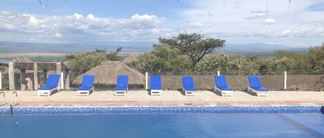 2 outdoor pools, open 8:00 AM to 8:00 PM, sun loungers