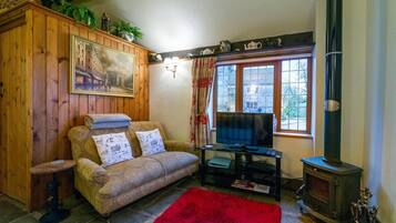 Ferienhaus, 1 Queen-Bett | Wohnbereich | Kamin