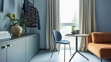 Studio | Premium bedding, laptop workspace, blackout drapes, soundproofing