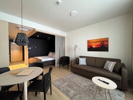 Standard Apartment | Living area | 40-inch flat-screen TV with cable channels, heated floors