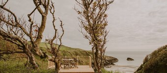 Coastal Magnificence: Saltwater Chronicles with private sea view deck.