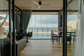 Deluxe Villa, Lanai, Bay View | Living area | Flat-screen TV - Sea&Sky Beach Resort (Koh Samui)