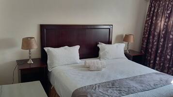 Family Room | 1 bedroom, individually decorated, individually furnished, desk