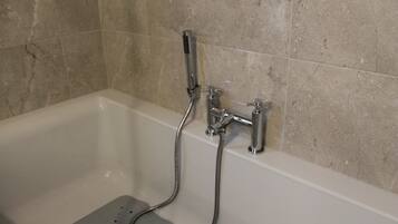 House, Multiple Beds | Bathroom | Combined shower/bathtub, deep-soaking bathtub, free toiletries