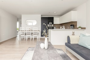 Apartment | Living area | 37-inch TV with cable channels, Netflix, streaming services