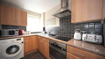 Apartment | Private kitchen | Fridge, microwave, oven, stovetop