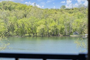 Guests can enjoy serene lakeside views from the comfort of their room.
