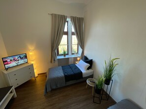 2 chambres, fer et planche à repasser, Wi-Fi, draps fournis