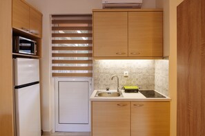 Appartamento | Cucina privata | Frigorifero, microonde, piano cottura