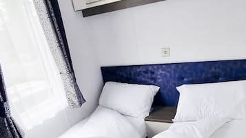 2 habitaciones, wifi gratis y ropa de cama
