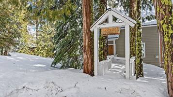 Welcome to Graham Cabin, where a charming porch invites you to enter.