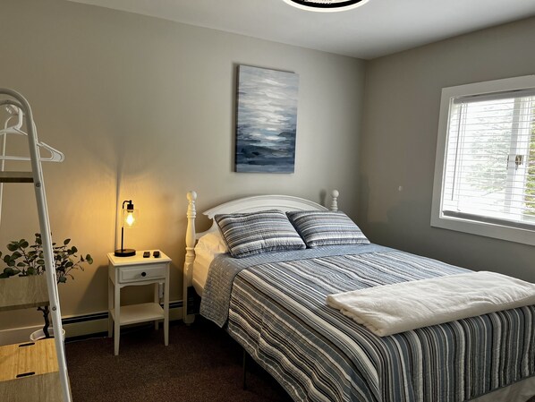 2 bedrooms, desk, iron/ironing board, travel crib