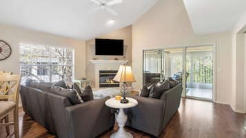 Condo, Multiple Beds, Fireplace, Garden View (Garden View Escape) | Living area | 42-inch flat-screen TV with digital channels, fireplace