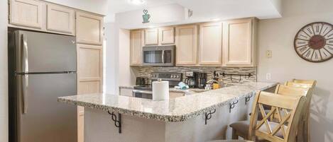 Condo, Multiple Beds, Fireplace, Garden View (Garden View Escape) | Private kitchen | Coffee/tea maker