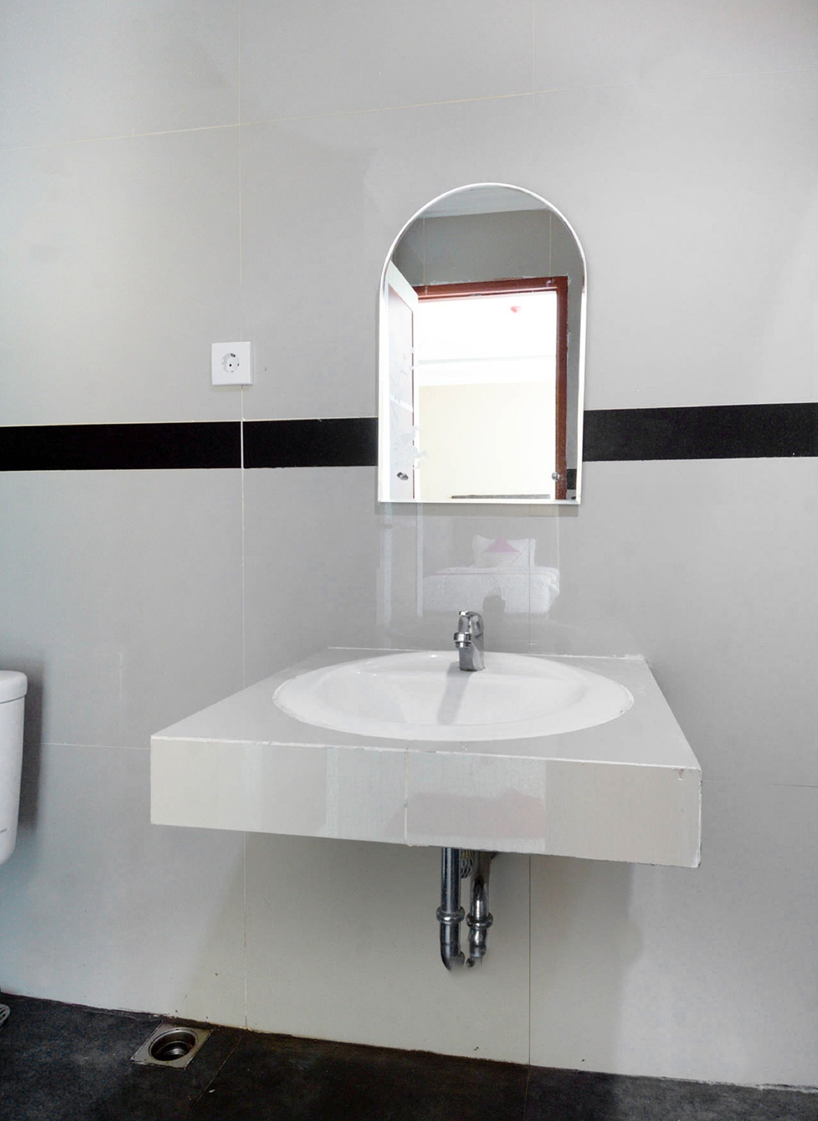 Foto - Collection O 3431 Hotel Alpha Bandara