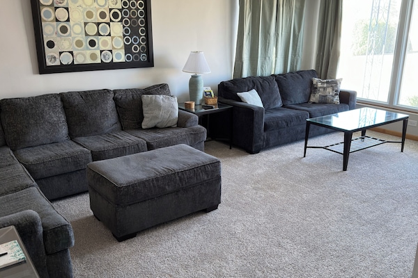 Spacious living room with sleeper sofa
