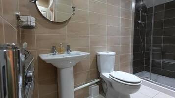 Apartment, Multiple Beds | Bathroom | Shower, hair dryer, towels