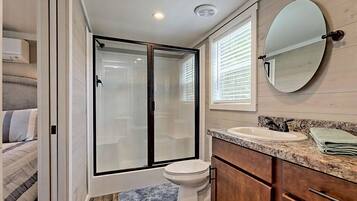 Shower, towels, soap, shampoo