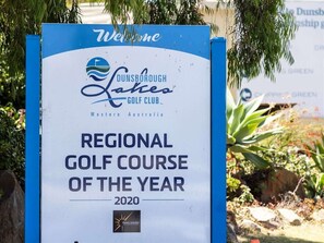 A sign for Dunsborough Lakes Golf Club announcing it as the Regional Golf Course of the Year 2020.