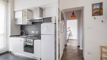 Apartment, 1 Bedroom | Private kitchen | Full-size fridge, oven, stovetop, dishwasher