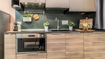 Apartment, 1 Bedroom | Private kitchen | Full-size fridge, stovetop, dishwasher, espresso maker