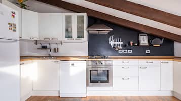 Apartment, 2 Bedrooms | Private kitchen | Full-size fridge, microwave, oven, stovetop