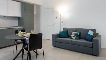 Economy Studio | Living area | 35-inch TV with digital channels