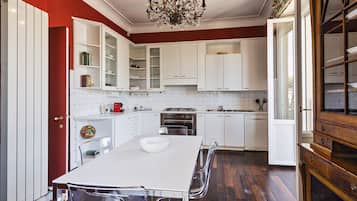 Apartment | Private kitchen | Full-size fridge, microwave, oven, stovetop