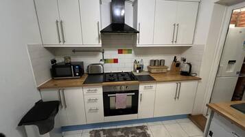 Apartment | Private kitchen | Fridge, microwave, oven, stovetop