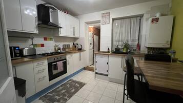Apartment | Private kitchen | Fridge, microwave, oven, stovetop
