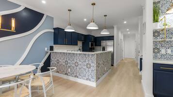 Luxury Townhome | Private kitchen | Full-size fridge, microwave, oven, dishwasher