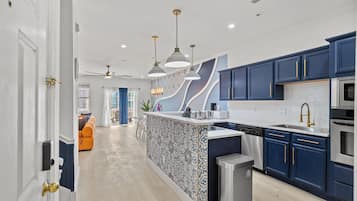 Luxury Townhome | Private kitchen | Full-size fridge, microwave, oven, dishwasher