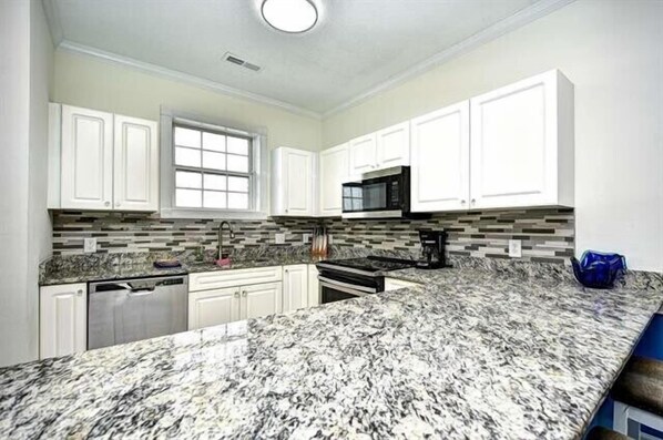 Fridge, microwave, oven, stovetop - Quiet Myrtlewood Condo for 4 • Family Fun & Golf Nearby (Myrtle Beach)