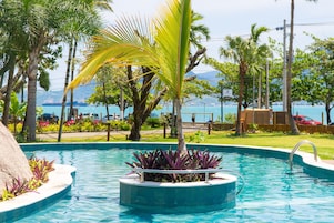 Outdoor pool, pool umbrellas, sun loungers