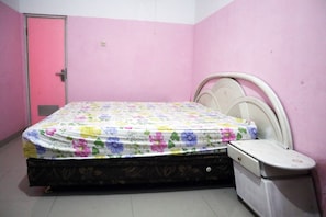 Laptop workspace, bed sheets