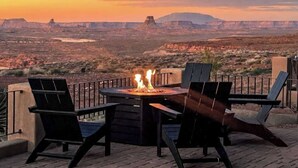 A patio with a fire pit and chairs overlooking a canyon. - The Overlook - Triple Primary Luxe, 50 Mile Views (Page)