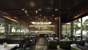 A modern restaurant with a bar area, seating, and large windows.