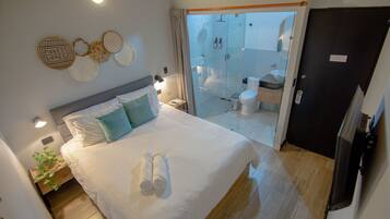 1 bedroom, desk, iron/ironing board, travel crib