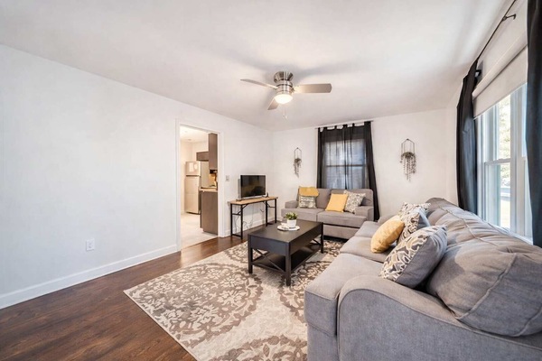 Spacious Living Area With TV