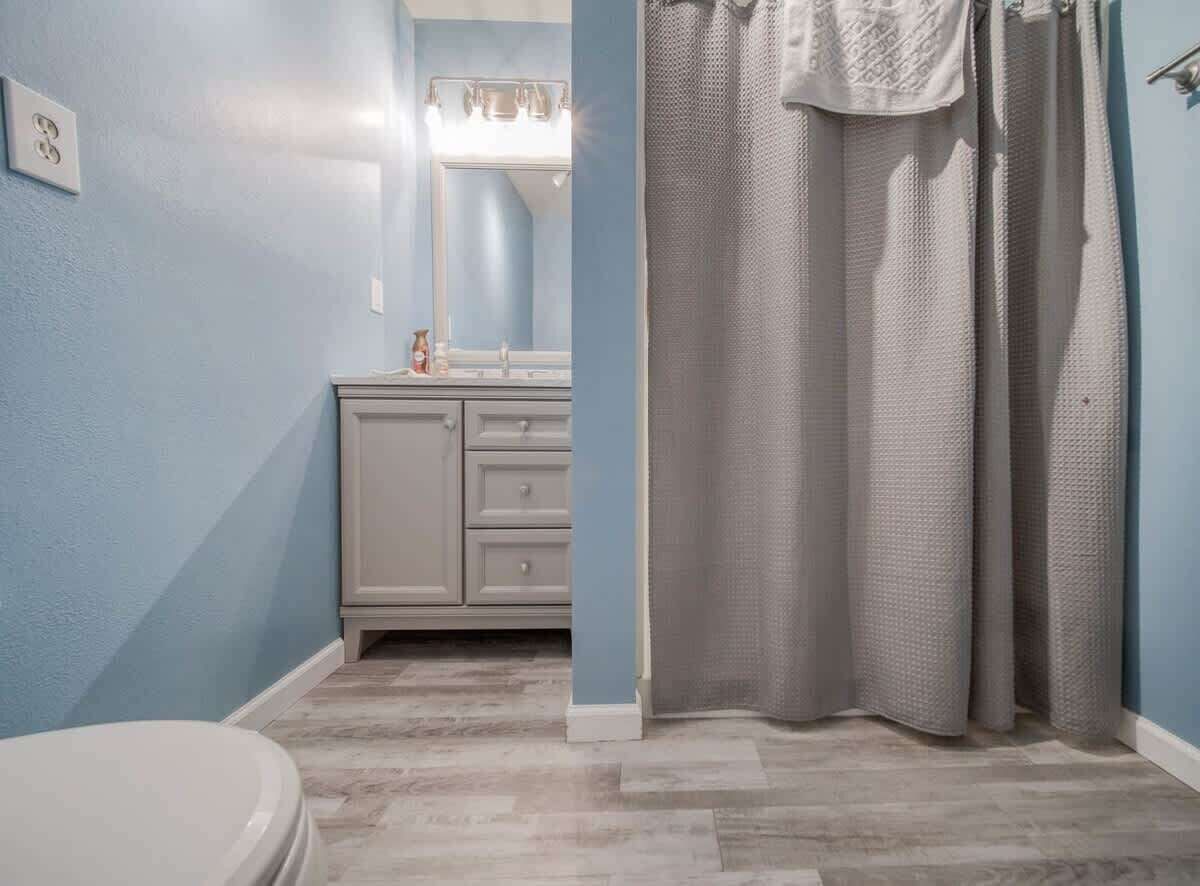 Bathtub, hair dryer, towels