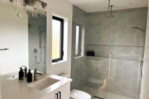 Shower, hair dryer, towels, soap