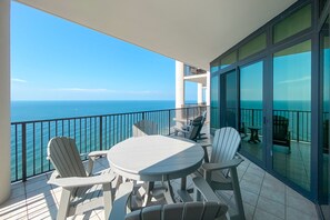 Outdoor dining - Luxurious "The Oasis at OB" formerly Phoenix West II 3br/4ba Beachfront Condo!  (Orange Beach)