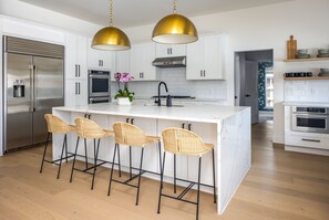 Fridge, microwave, oven, stovetop - Modern, Spacious Pool Home in Plano (Plano)